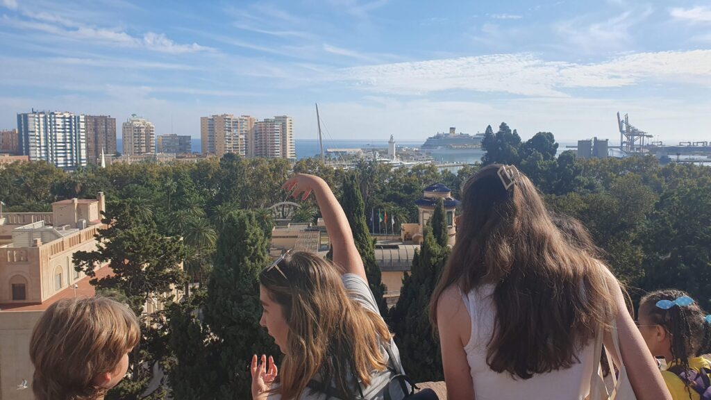 Children exploring Málaga's historic Alcazaba on an Adventures in Spanish immersion trip
