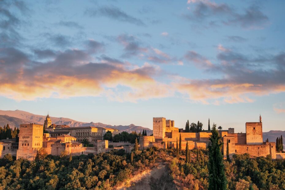 dawn over medieval castle on hill