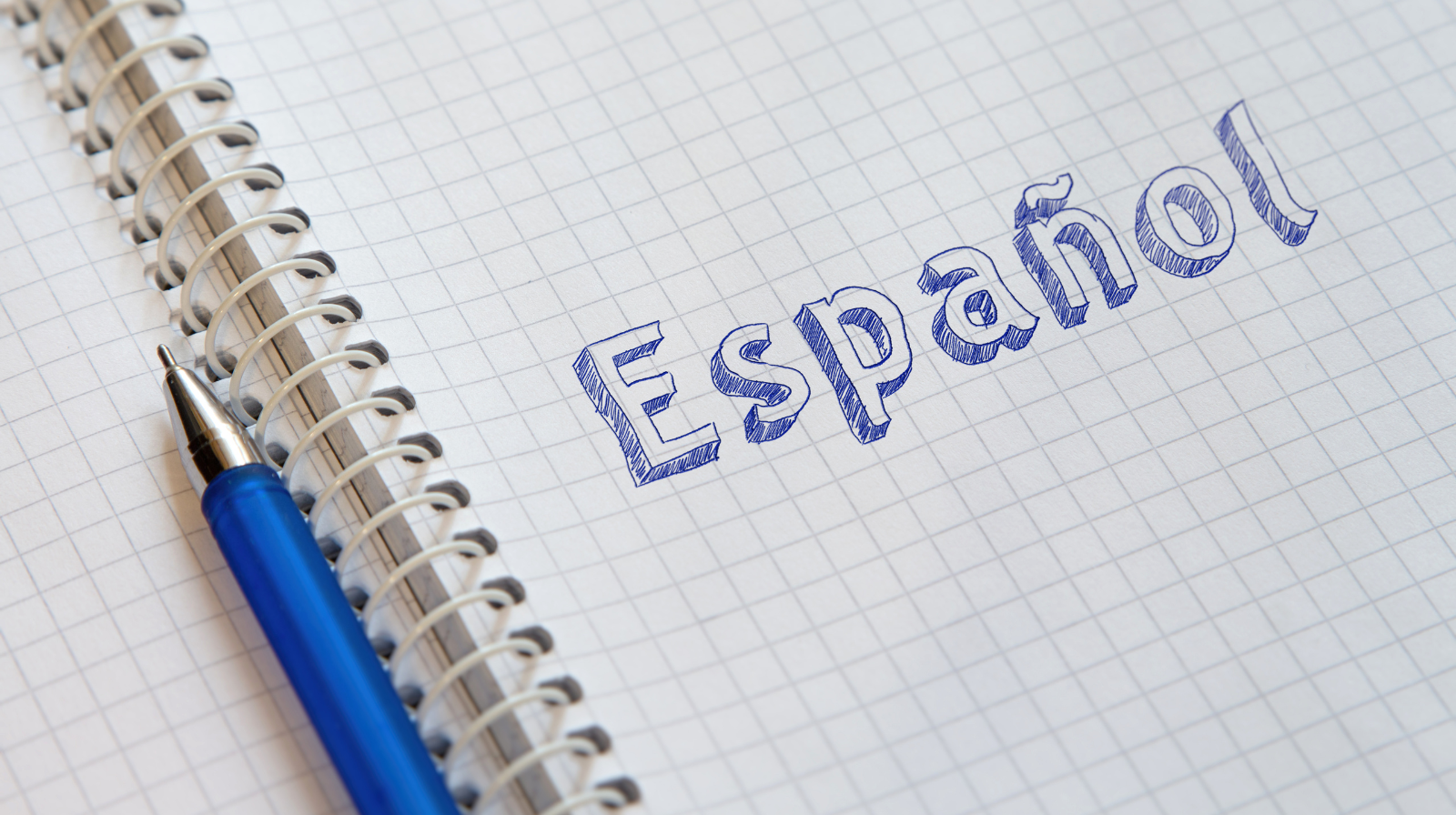 note book with spanish on it
